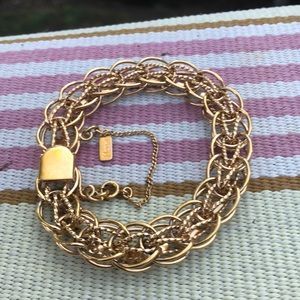 Monet Goldtone heart charm bracelet with safety chain